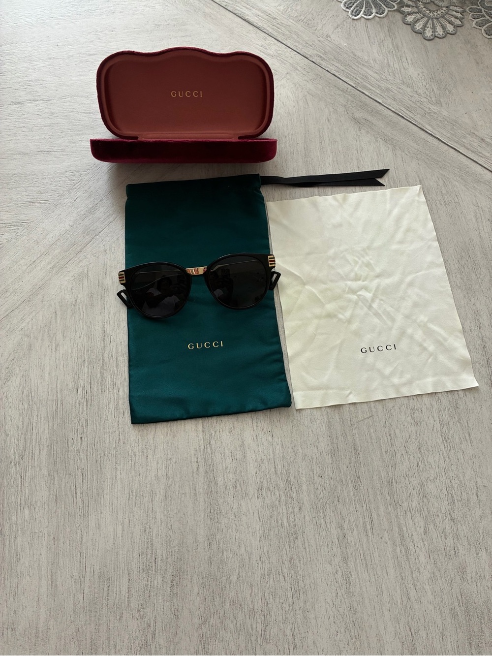 Gucci Women’s Black Sunglasses with Gold Details